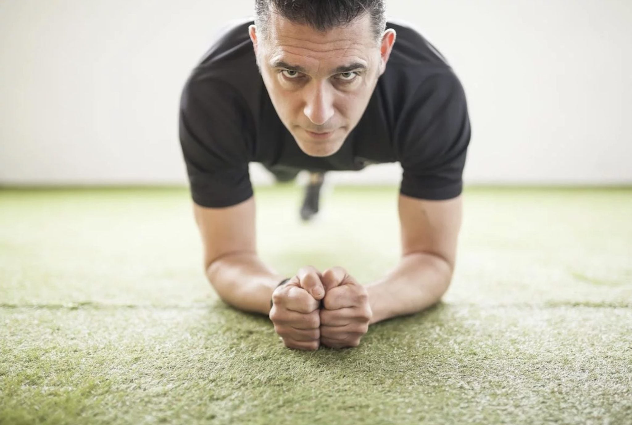 Man exercising indoors